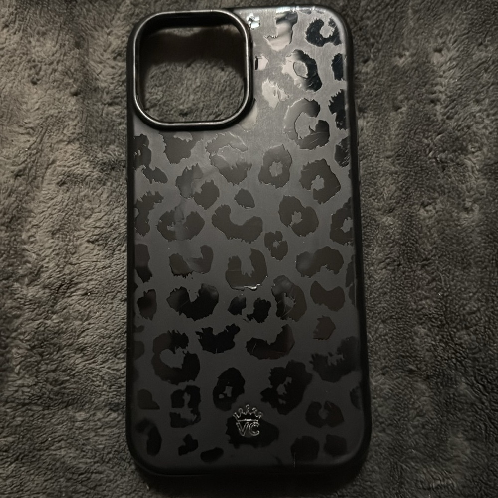 Black leopard print phone case.